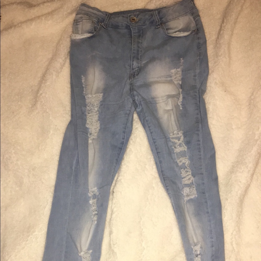 2 pairs of distressed jeans